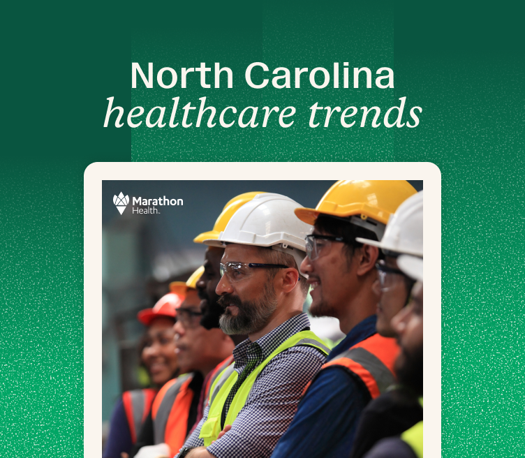 A group of North Carolina workers in hard hats and high-visibility vests standing together.